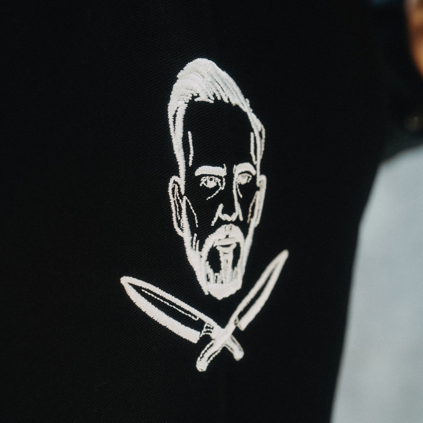 Schwarze Latzschürze - mit Logostick Stephan Schnieder